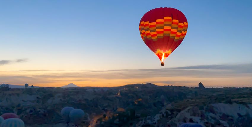 Hot air balloon at sunrise.