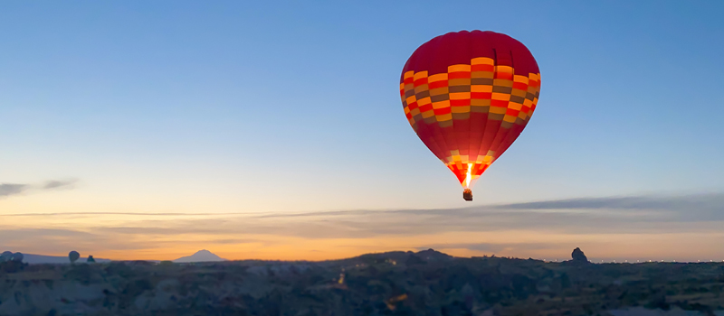 Hot air balloon at sunrise.