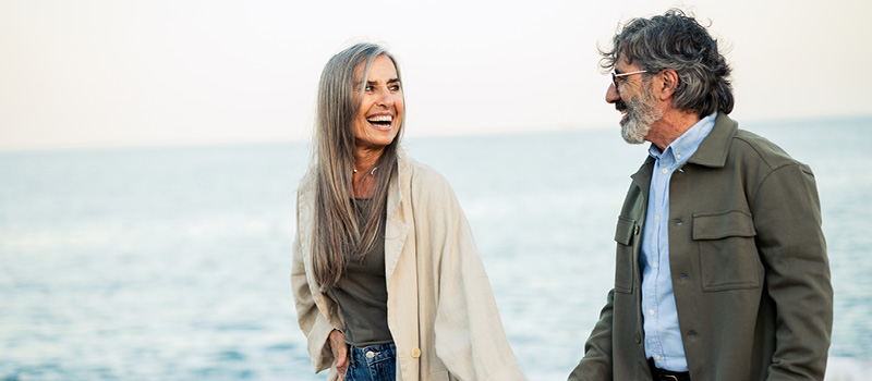 Portrait of happy couple on the beach.