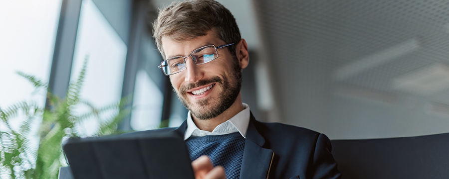Businessman looking at tablet.