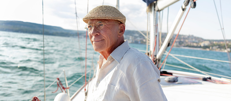 Retired man on a sailboat.
